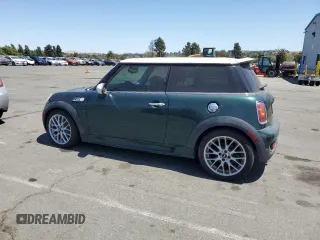 2009 MINI Hardtop S with VIN WMWMF73599TT96423, listed as a Copart auction lot 63913415 with 103,165 mi miles and Clean title. Bid and sale history available at DreamBid. Image 2.