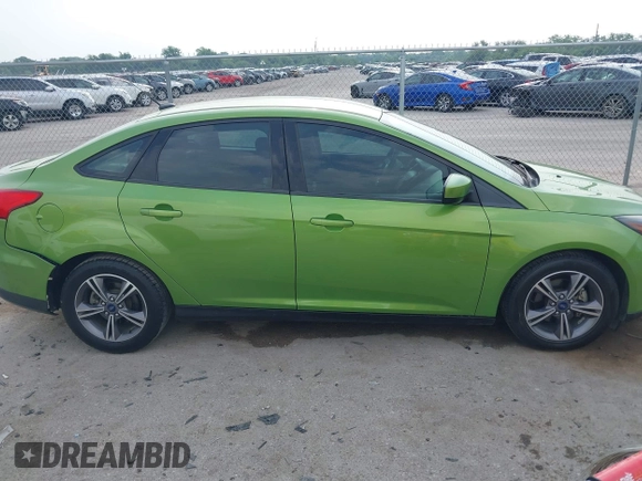 2018 Ford Focus SE z VIN 1FADP3FE5JL222542, wystawiony jako IAAI lot #42265608 z przebiegiem 107 397 mil mil oraz . Historia ofert i sprzedaży dostępna na DreamBid. Obrazek 13.