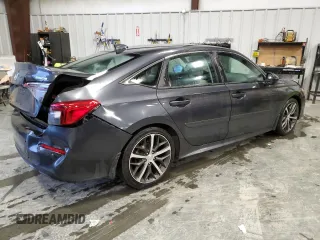 2022 Honda Civic Touring z VIN 2HGFE1F92NH315300, wystawiony jako Copart lot #44444605 z przebiegiem 52 469 mil mil oraz Szkoda całkowita • Salvage title. Historia ofert i sprzedaży dostępna na DreamBid. Obrazek 3.