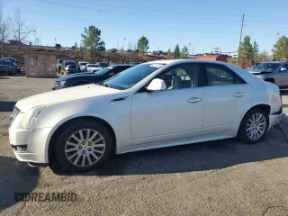 2013 Cadillac CTS Luxury with VIN 1G6DE5E58D0150340, listed as a Copart auction lot 48516525 with 106,972 mi miles and Salvage Title. Bid and sale history available at carsss.com. Image 1.