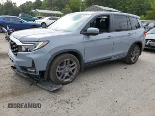 2022 Honda Passport EX-L z VIN 5FNYF7H51NB004450, wystawiony jako Copart lot #54874325 z przebiegiem 33 453 mil mil oraz Szkody całkowita. Historia ofert i sprzedaży dostępna na DreamBid. Obrazek 1.