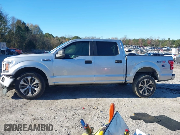 2019 Ford F-150 XL with VIN 1FTEW1CP9KFD40797, listed as a IAAI auction lot 41093672 with 69,717 mi miles and . Bid and sale history available at carsss.com. Image 15.