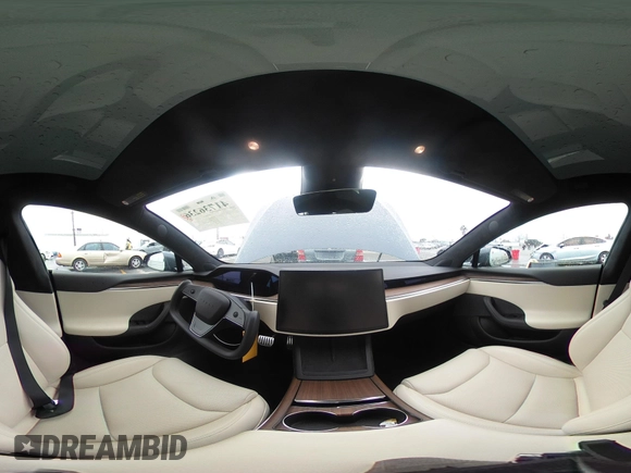 2022 Tesla Model S with VIN 5YJSA1E52NF459460, listed as a IAAI auction lot 41736236 with Not Provided miles and . Bid and sale history available at DreamBid. Image 21.