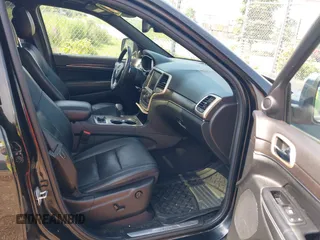 2014 Jeep Grand Cherokee Limited with VIN 1C4RJFBM5EC496734, listed as a IAAI auction lot 42809206 with 68,983 mi miles and . Bid and sale history available at DreamBid. Image 5.