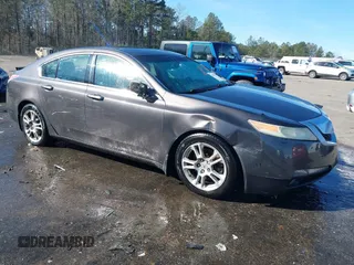 2010 Acura TL with VIN 19UUA8F29AA012716, listed as a IAAI auction lot 41565487 with 322,358 mi miles. Bid and sale history available at carsss.com. Image 1.