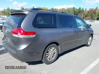 2014 Toyota Sienna XLE with VIN 5TDYK3DC1ES472036, listed as a IAAI auction lot 40546573 with 134,907 mi miles and . Bid and sale history available at DreamBid. Image 4.