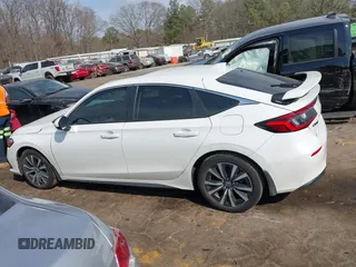 2024 Honda Civic EX-L z VIN 19XFL1H71RE027446, wystawiony jako IAAI lot #41687376 z przebiegiem 5 381 mil mil oraz . Historia ofert i sprzedaży dostępna na DreamBid. Obrazek 13.