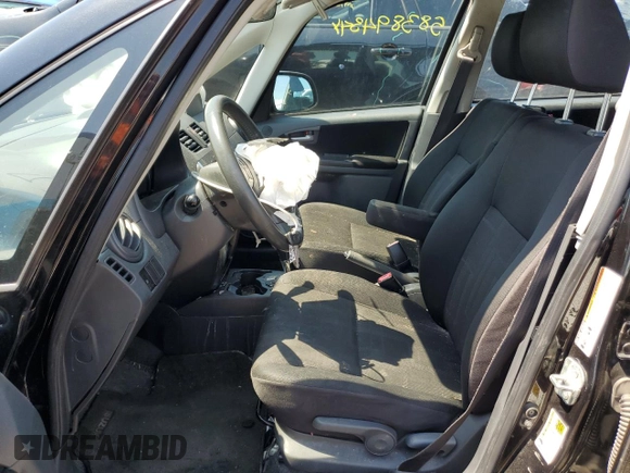 2011 Suzuki SX4 Crossover with VIN JS2YB5A37B6300689, listed as a Copart auction lot 58389434 with 126,802 mi miles and Salvage Title. Bid and sale history available at carsss.com. Image 7.