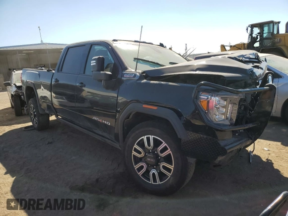 2023 GMC Sierra 3500HD AT4 z VIN 1GT49VEY1PF260918, wystawiony jako Copart lot #72765654 z przebiegiem 13 596 mil mil oraz Szkoda całkowita • Salvage title. Historia ofert i sprzedaży dostępna na DreamBid. Obrazek 4.