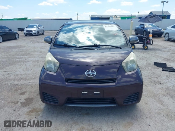 2012 Scion iQ with VIN JTNJJXB0XCJ021245, listed as a IAAI auction lot 42463167 with 158,901 mi miles and . Bid and sale history available at DreamBid. Image 12.