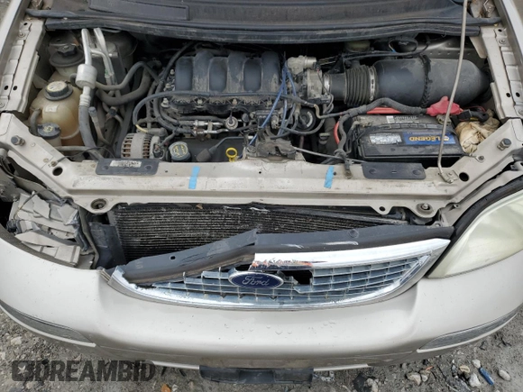 2003 Ford Windstar SE z VIN 2FMZA52473BA14056, wystawiony jako Copart lot #80307544 z przebiegiem 165 073 mil mil oraz Szkoda całkowita • Salvage title. Historia ofert i sprzedaży dostępna na DreamBid. Obrazek 13.