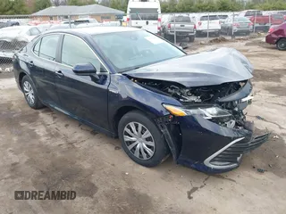 2021 Toyota Camry Hybrid LE with VIN 4T1C31AKXMU565585, listed as a IAAI auction lot 41057955 with 31,976 mi miles. Bid and sale history available at carsss.com. Image 14.