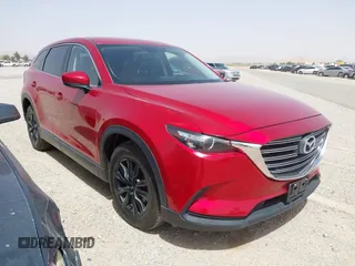 2016 Mazda CX-9 Touring z VIN JM3TCACY9G0102524, wystawiony jako IAAI lot #42305452 z przebiegiem 76 892 mil mil oraz . Historia ofert i sprzedaży dostępna na DreamBid. Obrazek 1.