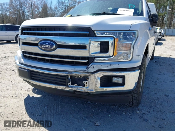 2018 Ford F-150 XL with VIN 1FTFX1C57JKF08037, listed as a IAAI auction lot 41863806 with 195,725 mi miles and . Bid and sale history available at DreamBid. Image 6.