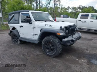 2022 Jeep Wrangler Sport S z VIN 1C4GJXAN9NW124190, wystawiony jako IAAI lot #42027247 z przebiegiem 8 376 mil mil oraz . Historia ofert i sprzedaży dostępna na DreamBid. Obrazek 1.