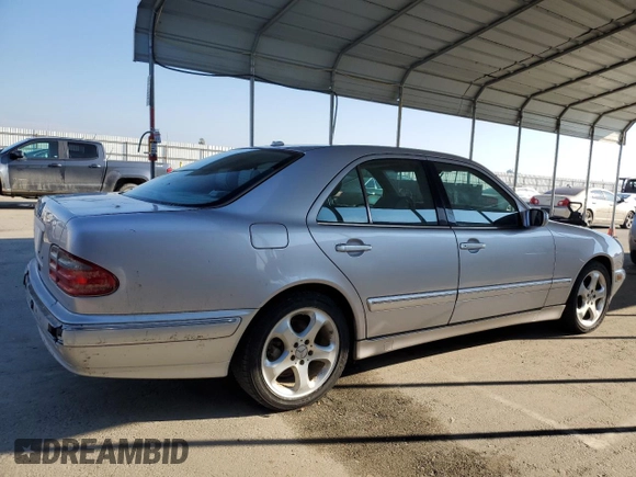 2002 Mercedes-Benz E-Class with VIN WDBJF65J12B488632, listed as a Copart auction lot 87060504 with 273,135 mi miles and Salvage Title. Bid and sale history available at carsss.com. Image 3.
