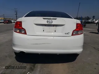 2013 Scion tC z VIN JTKJF5C77D3063067, wystawiony jako Copart lot #54264625 z przebiegiem 74 351 mil mil oraz Szkoda całkowita • Salvage title. Historia ofert i sprzedaży dostępna na DreamBid. Obrazek 6.