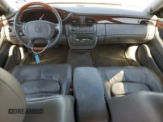 2003 Cadillac DeVille DHS z VIN 1G6KE54Y13U124690, wystawiony jako Copart lot #73757984 z przebiegiem 101 286 mil mil oraz Szkoda całkowita • Salvage title. Historia ofert i sprzedaży dostępna na DreamBid. Obrazek 8.