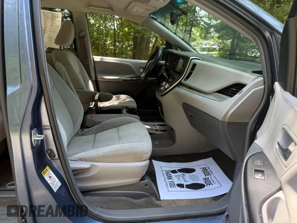 2015 Toyota Sienna LE AAS with VIN 5TDKK3DC1FS623710, listed as a Copart auction lot 62335575 with 221,148 mi miles and Clean title. Bid and sale history available at DreamBid. Image 5.