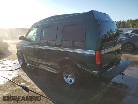 1998 GMC Safari z VIN 1GDDM19W5WB503552, wystawiony jako Copart lot #88247495 z przebiegiem 267 494 mil mil oraz Szkoda całkowita • Salvage title. Historia ofert i sprzedaży dostępna na DreamBid. Obrazek 2.