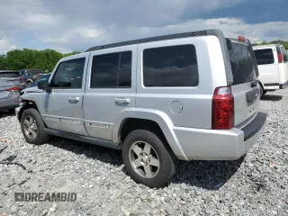 2009 Jeep Commander Sport with VIN 1J8HH48K89C540189, listed as a Copart auction lot 52552235 with 258,377 mi miles and Salvage title. Bid and sale history available at DreamBid. Image 2.
