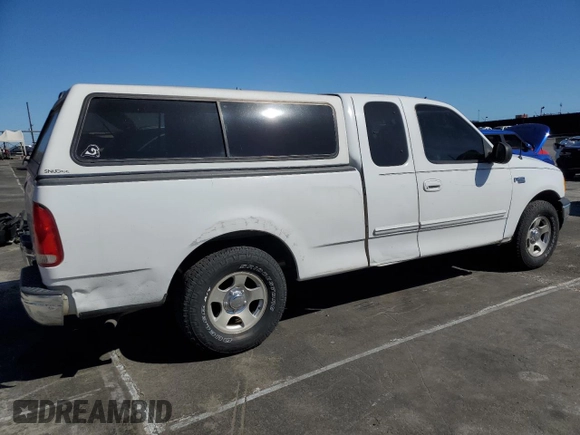 2000 Ford F-150 XL with VIN 1FTZX172XYNC01869, listed as a Copart auction lot 47414095 with 0 mi miles and Salvage Title. Bid and sale history available at carsss.com. Image 3.