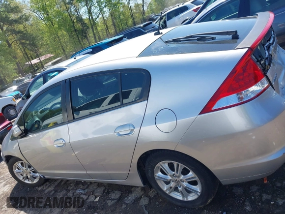 2010 Honda Insight EX with VIN JHMZE2H75AS013109, listed as a IAAI auction lot 41976886 with 226,434 mi miles and . Bid and sale history available at DreamBid. Image 14.