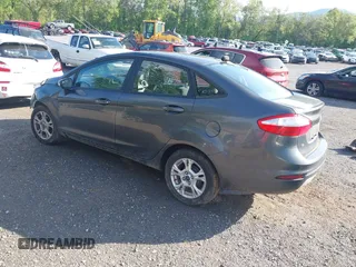 2016 Ford Fiesta SE z VIN 3FADP4BJ8GM184675, wystawiony jako IAAI lot #42169234 z przebiegiem 54 231 mil mil oraz . Historia ofert i sprzedaży dostępna na DreamBid. Obrazek 3.