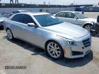 2014 Cadillac CTS Performance RWD with VIN 1G6AS5SX8E0196334, listed as a IAAI auction lot 42625828 with 123,815 mi miles and . Bid and sale history available at DreamBid. Image 1.