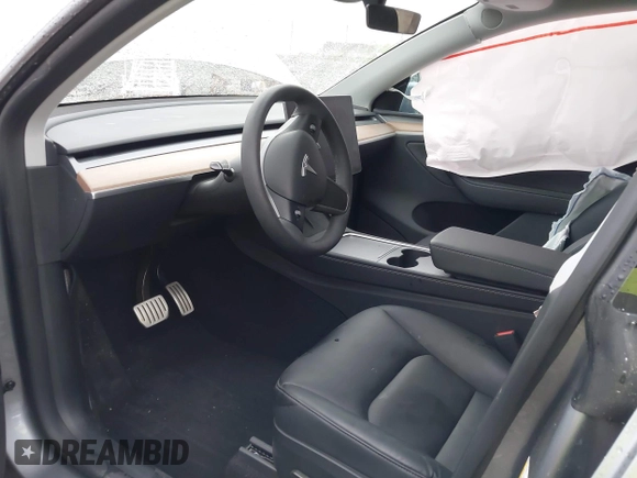 2024 Tesla Model Y Performance with VIN 7SAYGDEF2RA322351, listed as a IAAI auction lot 41953896 with 8,959 mi miles and . Bid and sale history available at DreamBid. Image 5.