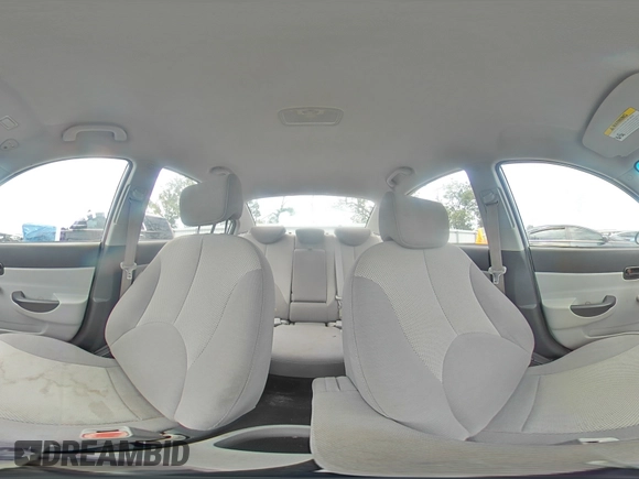 2009 Hyundai Accent Auto GLS z VIN KMHCN46C19U373167, wystawiony jako Copart lot #60026445 z przebiegiem 94 736 mil mil oraz Szkoda całkowita • Salvage title. Historia ofert i sprzedaży dostępna na DreamBid. Obrazek 15.