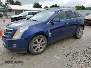 2012 Cadillac SRX Performance Collection with VIN 3GYFNBE35CS579214, listed as a Copart auction lot 54725465 with 114,829 mi miles and Salvage title. Bid and sale history available at DreamBid. Image 1.
