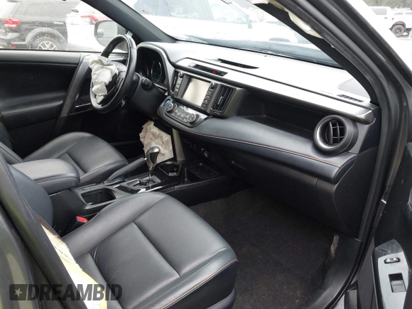 2018 Toyota RAV4 Hybrid SE with VIN JTMJJREV7JD208249, listed as a IAAI auction lot 41859301 with 91,899 mi miles and . Bid and sale history available at DreamBid. Image 5.