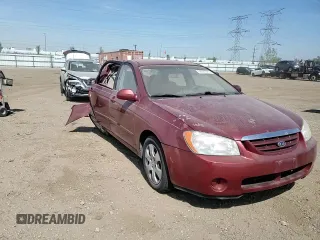 2005 Kia Spectra LX z VIN KNAFE121355162932, wystawiony jako Copart lot #56292625 z przebiegiem 92 828 mil mil oraz Szkoda całkowita • Salvage title. Historia ofert i sprzedaży dostępna na DreamBid. Obrazek 13.