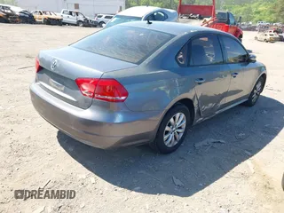 2012 Volkswagen Passat S w/Appearance with VIN 1VWAH7A37CC080086, listed as a IAAI auction lot 42064603 with 188,256 mi miles. Bid and sale history available at carsss.com. Image 4.