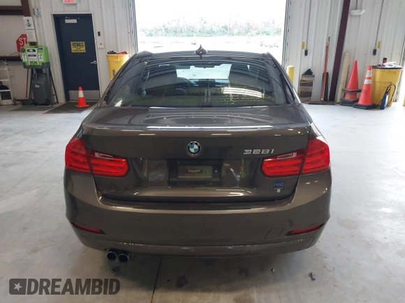 2015 BMW 3 Series 328i with VIN WBA3A5C57FF609734, listed as a IAAI auction lot 41392336 with 121,378 mi miles. Bid and sale history available at carsss.com. Image 16.