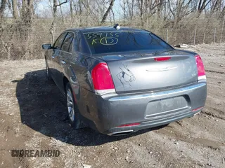 2017 Chrysler 300 with VIN 2C3CCAEG2HH559755, listed as a IAAI auction lot 41854444 with 135,744 mi miles. Bid and sale history available at carsss.com. Image 3.