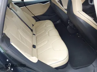 2013 Tesla Model S с VIN 5YJSA1CN1DFP27013, выставлен на аукционе IAAI как лот 42014212 с пробегом 65 858 миль миль и . История ставок и продаж доступна на DreamBid. Изображение 8.