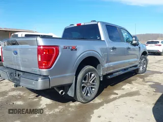 2021 Ford F-150 XL with VIN 1FTEW1EP2MFC44056, listed as a IAAI auction lot 41716105 with 58,979 mi miles and . Bid and sale history available at DreamBid. Image 4.