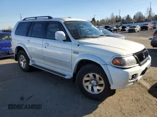 2003 Mitsubishi Montero z VIN JA4MT41RX3J013246, wystawiony jako Copart lot #42210545 z przebiegiem 188 387 mil mil oraz Szkoda całkowita • Salvage title. Historia ofert i sprzedaży dostępna na DreamBid. Obrazek 4.