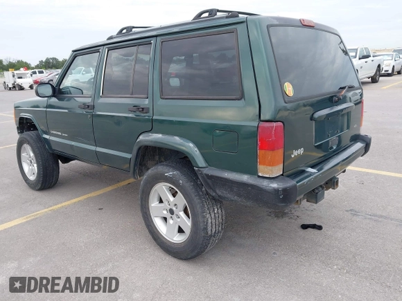 1999 Jeep Cherokee Sport z VIN 1J4FT68S1XL667138, wystawiony jako IAAI lot #42651020 z przebiegiem 200 324 mil mil oraz . Historia ofert i sprzedaży dostępna na DreamBid. Obrazek 3.