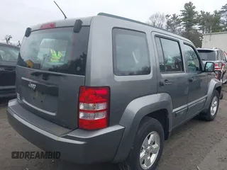 2012 Jeep Liberty Sport with VIN 1C4PJMAK4CW199803, listed as a IAAI auction lot 42025900 with 169,824 mi miles and . Bid and sale history available at carsss.com. Image 4.