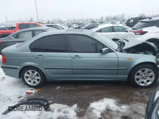2005 BMW 3 Series 325i with VIN WBAEV33475KW16987, listed as a IAAI auction lot 41353913 with 211,222 mi miles. Bid and sale history available at carsss.com. Image 12.