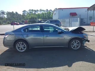 2014 Nissan Maxima S z VIN 1N4AA5AP2EC909623, wystawiony jako IAAI lot #42390407 z przebiegiem 182 610 mil mil oraz . Historia ofert i sprzedaży dostępna na DreamBid. Obrazek 13.
