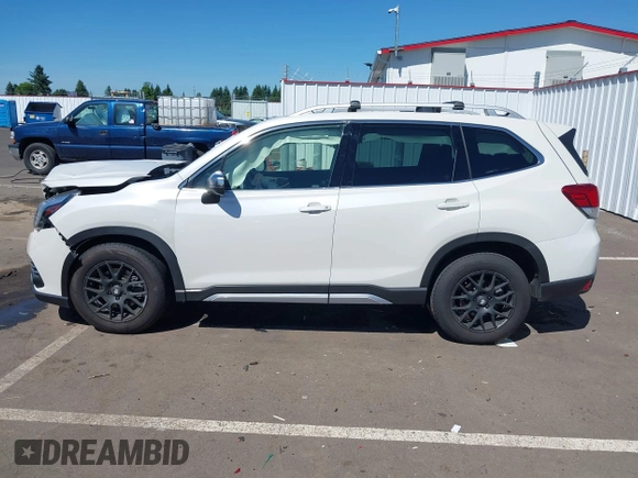 2022 Subaru Forester Touring with VIN JF2SKARC9NH445126, listed as a IAAI auction lot 42350111 with 61,998 mi miles and . Bid and sale history available at DreamBid. Image 15.
