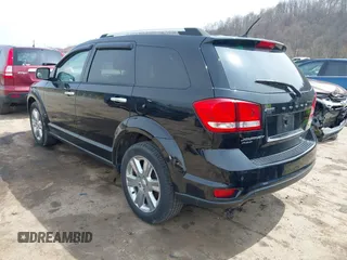 2014 Dodge Journey Limited with VIN 3C4PDDDG8ET150059, listed as a IAAI auction lot 41915239 with 120,897 mi miles and . Bid and sale history available at carsss.com. Image 3.