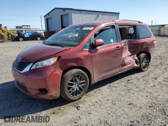 2014 Toyota Sienna LE with VIN 5TDJK3DC5ES093932, listed as a Copart auction lot 63611985 with 142,044 mi miles and Salvage title. Bid and sale history available at DreamBid. Image 1.