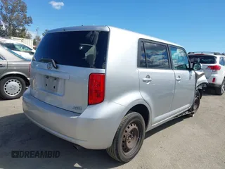 2009 Scion xB with VIN JTLKE50E991081756, listed as a IAAI auction lot 41952232 with 167,079 mi miles. Bid and sale history available at carsss.com. Image 4.