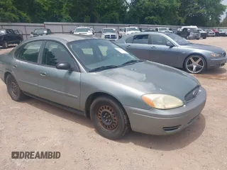 2007 Ford Taurus SE z VIN 1FAFP53U67A138864, wystawiony jako IAAI lot #42253452 z przebiegiem 221 015 mil mil oraz . Historia ofert i sprzedaży dostępna na DreamBid. Obrazek 1.
