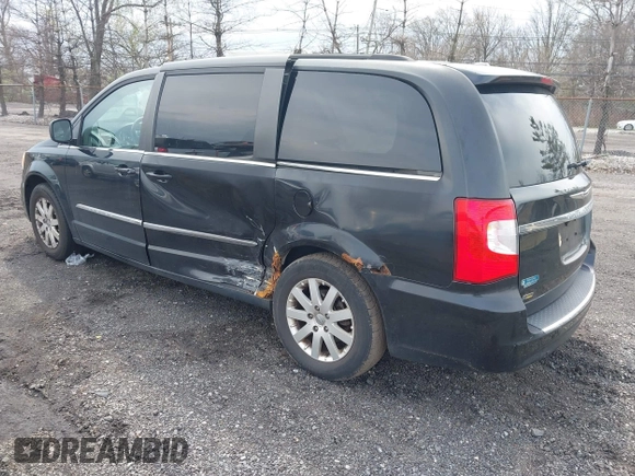 2011 Chrysler Town & Country Touring L with VIN 2A4RR8DG7BR641782, listed as a IAAI auction lot 42042025 with 141,884 mi miles and . Bid and sale history available at DreamBid. Image 3.